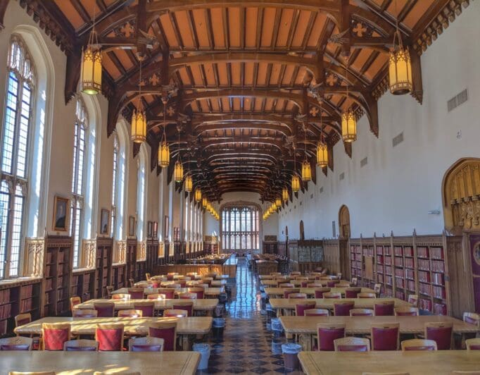 A university study hall with gothic church style architecture.