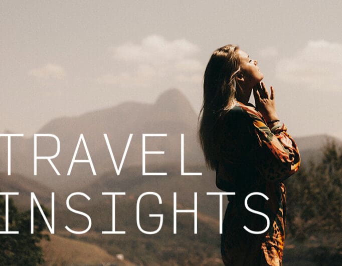 A peaceful woman with a scenic mountain background and the caption "Travel Insights".